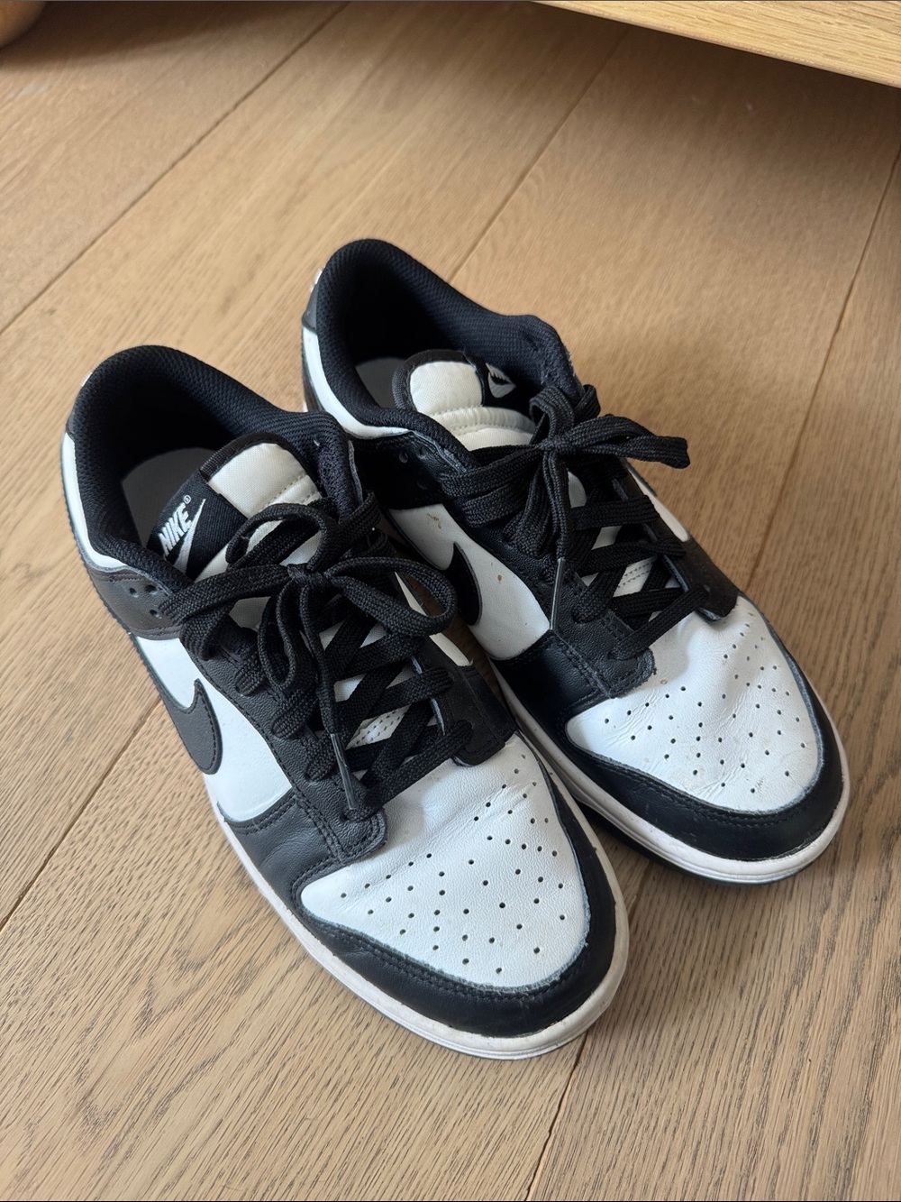 Nike Women’s Low Dunk black and white sneakers